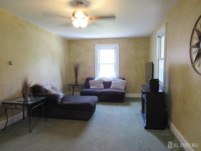 1211 S 9th St, South Plainfield, NJ 07080 - carpeted living area featuring ceiling fan and baseboards