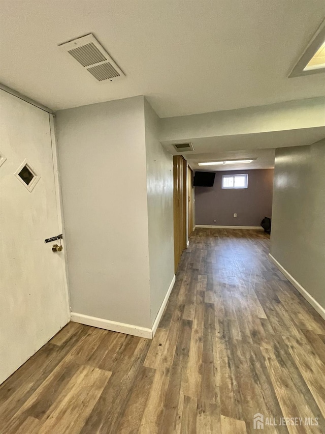 1211 S 9th St, South Plainfield, NJ 07080 - basement with wood finished floors and baseboards
