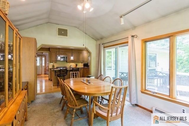 57 Jensen St, East Brunswick, NJ 08816 - dining space featuring vaulted ceiling, light carpet, and ceiling fan