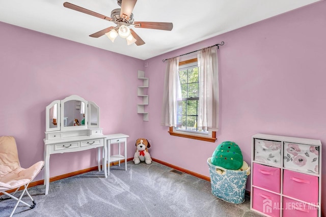 recreation room featuring baseboards, carpet, and ceiling fan