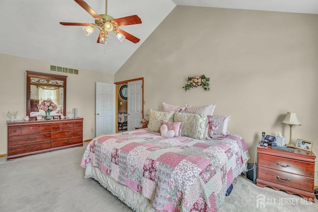 bedroom featuring carpet, high vaulted ceiling, and ceiling fan