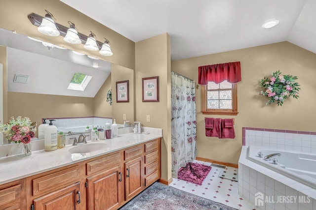 bathroom with a skylight, lofted ceiling, vanity, baseboards, and a bath