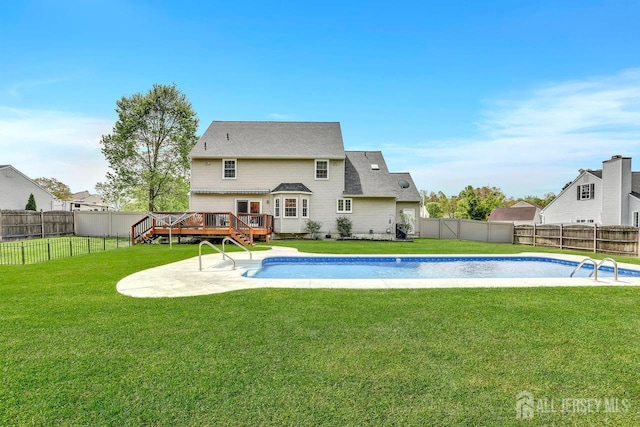 view of swimming pool with a deck and a patio area