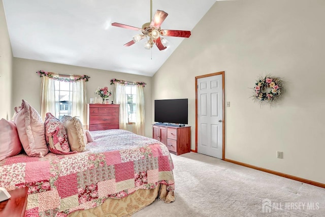 bedroom featuring baseboards, high vaulted ceiling, light colored carpet, and a ceiling fan