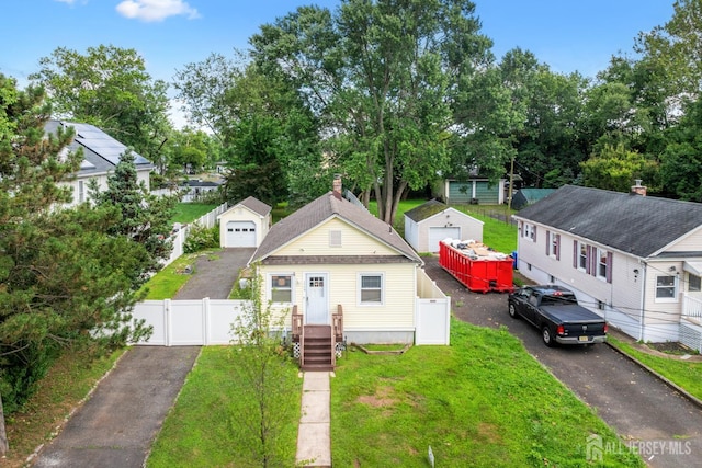 1775 W 5th St, Piscataway, NJ 08854 - bungalow with a gate and an outdoor structure