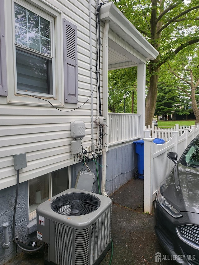 72 High St, Perth Amboy, NJ 08861 - view of home's exterior with central AC