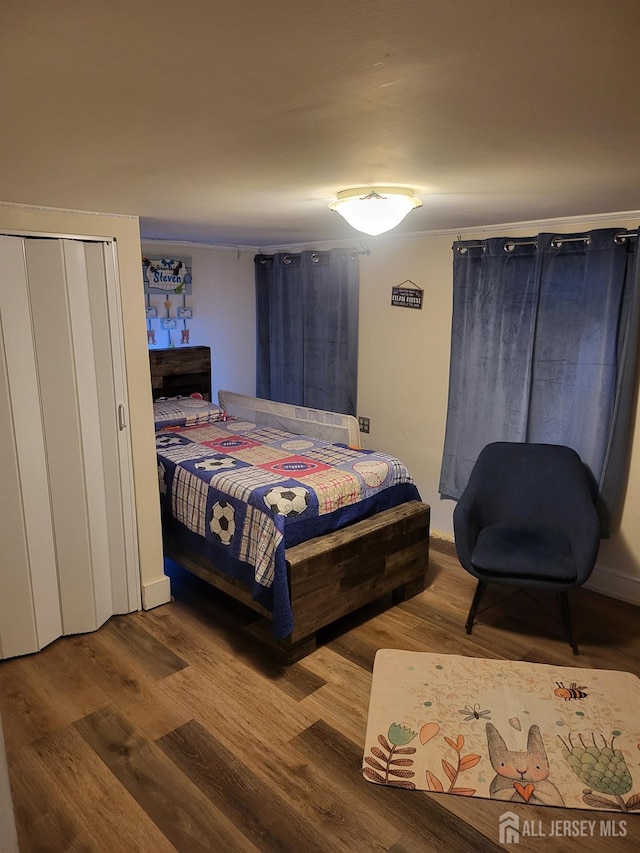 72 High St, Perth Amboy, NJ 08861 - bedroom with wood finished floors
