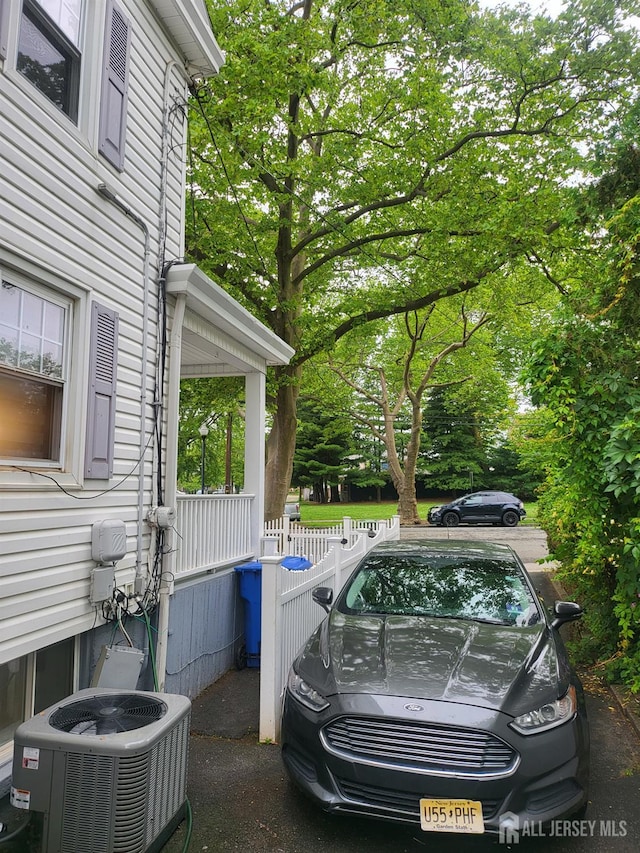 72 High St, Perth Amboy, NJ 08861 - view of home's exterior featuring a central AC unit