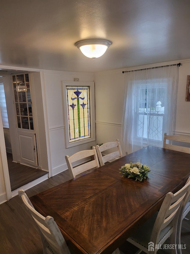 72 High St, Perth Amboy, NJ 08861 - dining room with wood finished floors and plenty of natural light