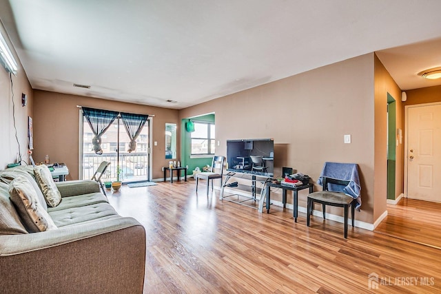 living room with light wood-type flooring