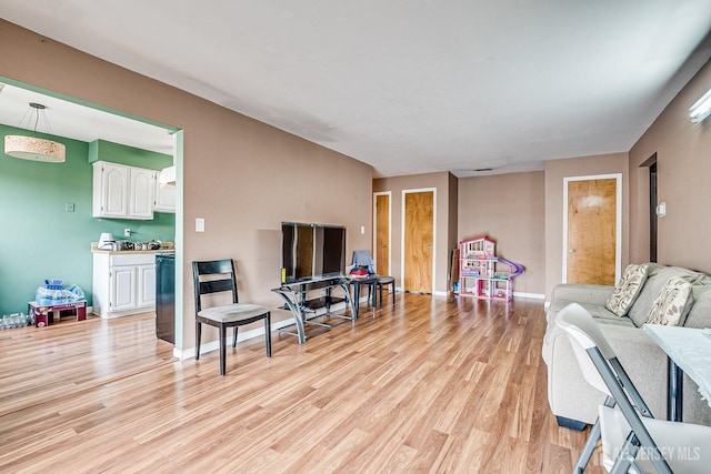 living room with light hardwood / wood-style floors