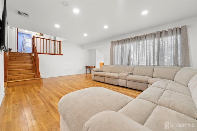 2291 Morrison Ave, Union Twp, NJ 07083 - living room featuring light wood-type flooring, stairway, recessed lighting, and baseboards