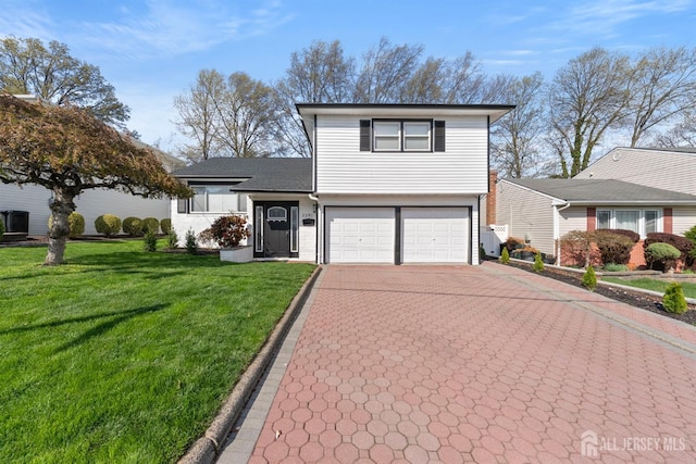 2291 Morrison Ave, Union Twp, NJ 07083 - traditional home with an attached garage, a front yard, and driveway