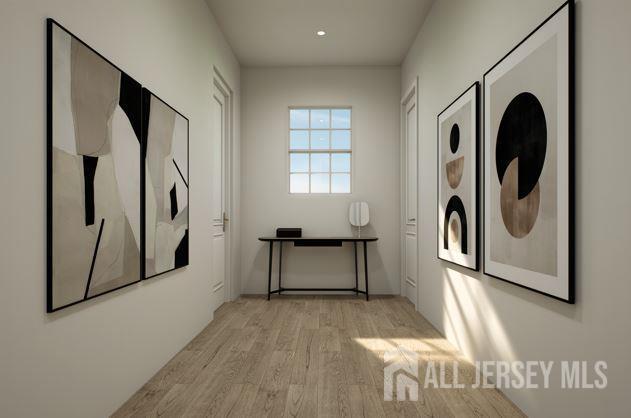 25 Wicker Pl, Morganville, NJ 07751 - laundry area with light wood-style floors