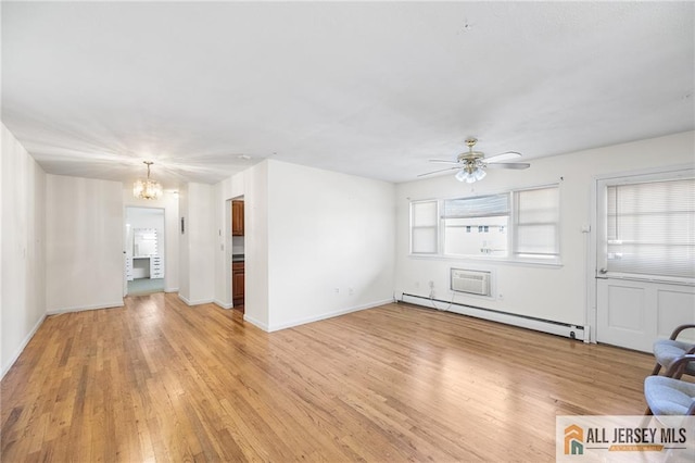 unfurnished living room with a baseboard heating unit, ceiling fan with notable chandelier, baseboards, and light wood-style floors