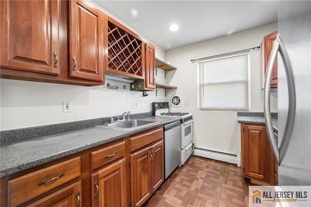 kitchen featuring dark countertops, a baseboard radiator, stainless steel appliances, open shelves, and a sink