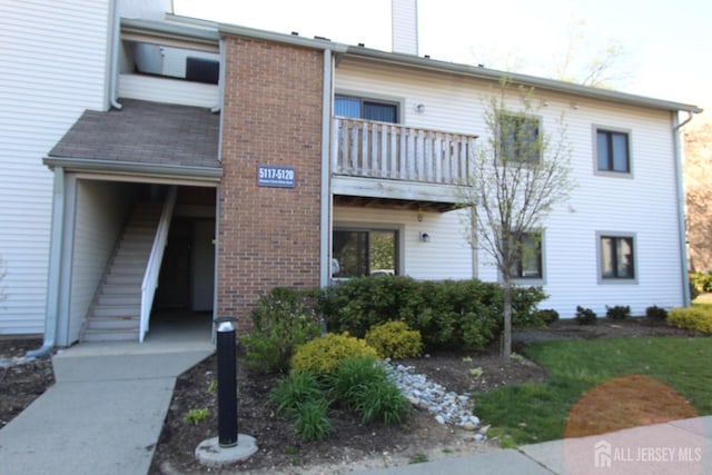 view of property with stairs