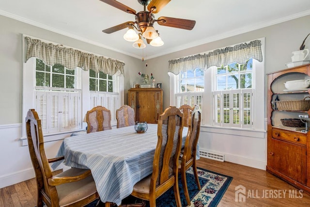 340 Runyon Ave, Middlesex, NJ 08846 - dining area with plenty of natural light, crown molding, ceiling fan, and wood finished floors
