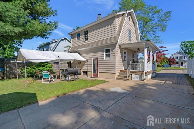 340 Runyon Ave, Middlesex, NJ 08846 - back of house with driveway, a patio, and a chimney