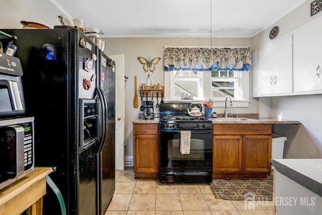 340 Runyon Ave, Middlesex, NJ 08846 - kitchen featuring black appliances, a sink, crown molding, brown cabinetry, and light tile patterned floors