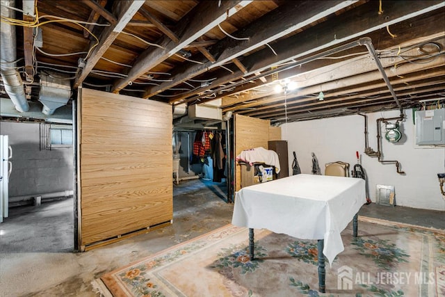 340 Runyon Ave, Middlesex, NJ 08846 - unfinished below grade area featuring electric panel, gas meter, and freestanding refrigerator