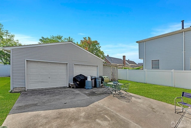 garage with fence