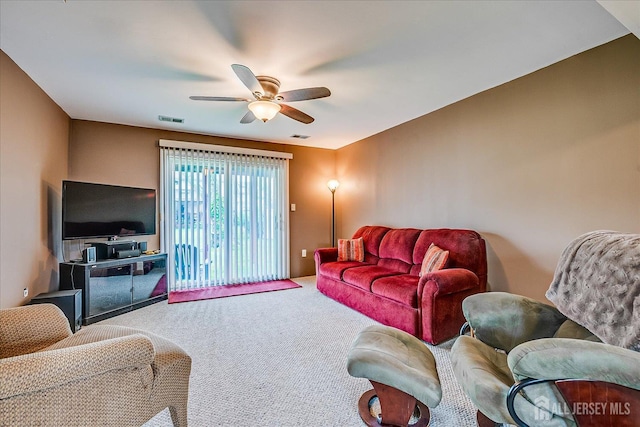 115 Broadway Ave, Colonia, NJ 07067 - living area with a ceiling fan and carpet floors