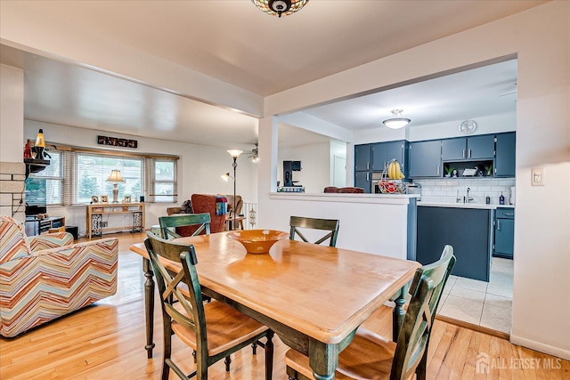 115 Broadway Ave, Colonia, NJ 07067 - dining area with light wood-style floors