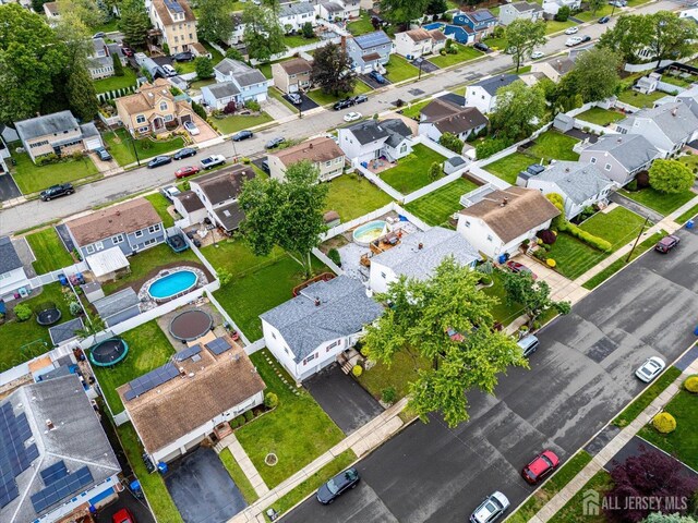 115 Broadway Ave, Colonia, NJ 07067 - aerial overview of property's location with nearby suburban area and a pool area