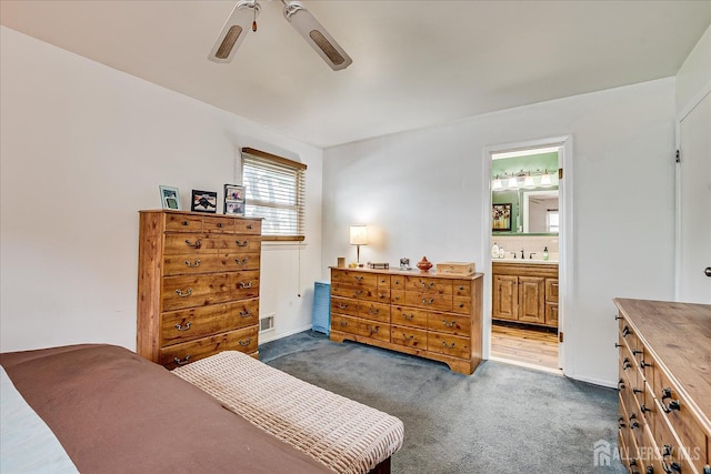 115 Broadway Ave, Colonia, NJ 07067 - carpeted bedroom featuring ensuite bath, ceiling fan, and a sink