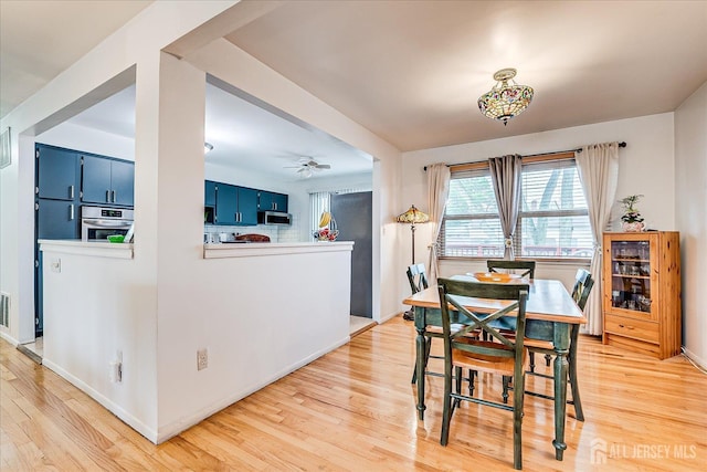 115 Broadway Ave, Colonia, NJ 07067 - dining area with light wood-type flooring, ceiling fan, and baseboards