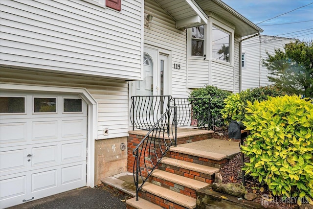 115 Broadway Ave, Colonia, NJ 07067 - property entrance with a garage