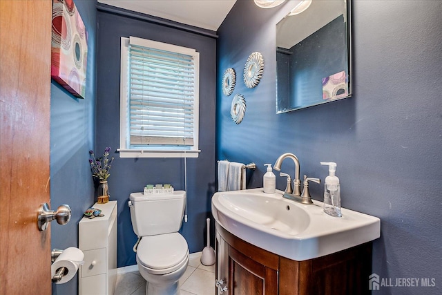 115 Broadway Ave, Colonia, NJ 07067 - half bath with vanity, toilet, tile patterned flooring, and baseboards