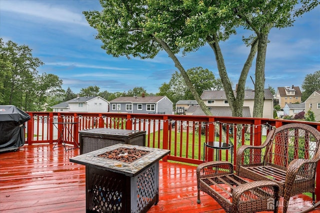 115 Broadway Ave, Colonia, NJ 07067 - deck with an outdoor fire pit, a residential view, and area for grilling