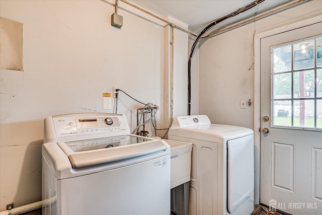 115 Broadway Ave, Colonia, NJ 07067 - laundry area with washer and clothes dryer