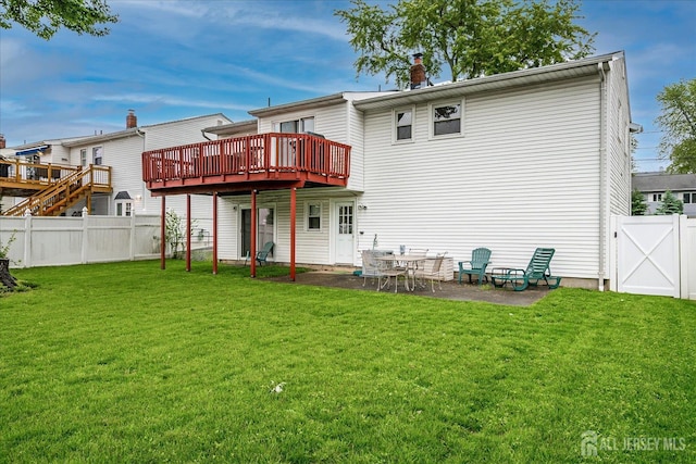 115 Broadway Ave, Colonia, NJ 07067 - rear view of property with a wooden deck, a patio area, and a gate