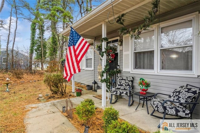 entrance to property with covered porch