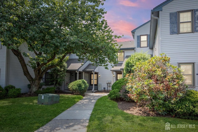 304 Woodbridge Commons Way, Iselin, NJ 08830 - view of front of house with a front lawn
