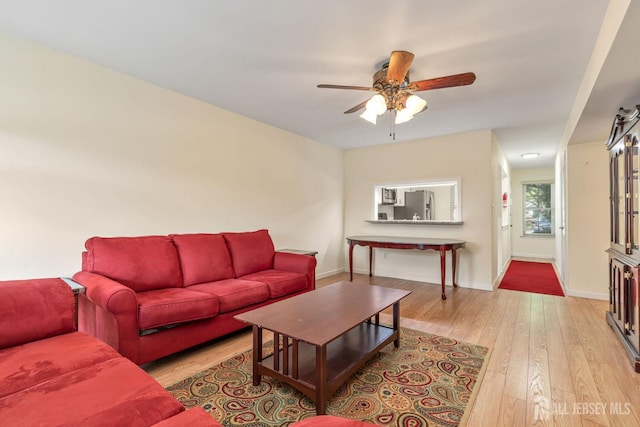 304 Woodbridge Commons Way, Iselin, NJ 08830 - living area with a ceiling fan and wood finished floors