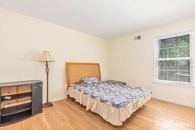 304 Woodbridge Commons Way, Iselin, NJ 08830 - bedroom with light wood-style flooring