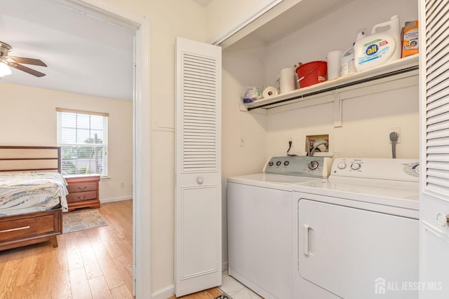 304 Woodbridge Commons Way, Iselin, NJ 08830 - laundry room featuring washing machine and clothes dryer, a ceiling fan, and light wood finished floors