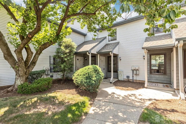 304 Woodbridge Commons Way, Iselin, NJ 08830 - view of front facade with roof with shingles