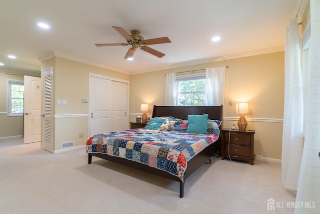 bedroom with carpet floors, recessed lighting, a closet, baseboards, and ornamental molding