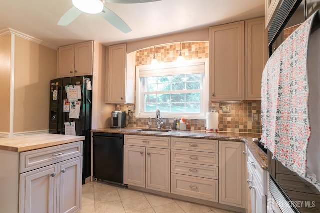 kitchen with black appliances, a sink, backsplash, wooden counters, and ceiling fan