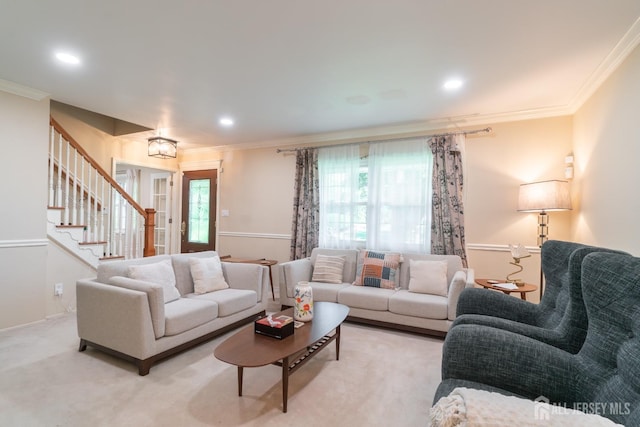living area with crown molding, stairway, and recessed lighting