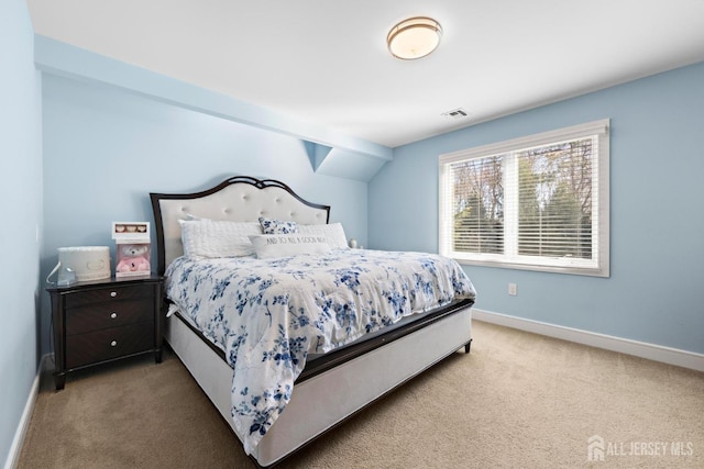 bedroom featuring carpet, visible vents, and baseboards