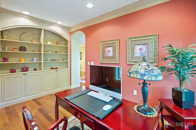 540 Cranbury Rd Unit 105, East Brunswick, NJ 08816 - home office featuring crown molding, arched walkways, light wood-type flooring, built in features, and recessed lighting