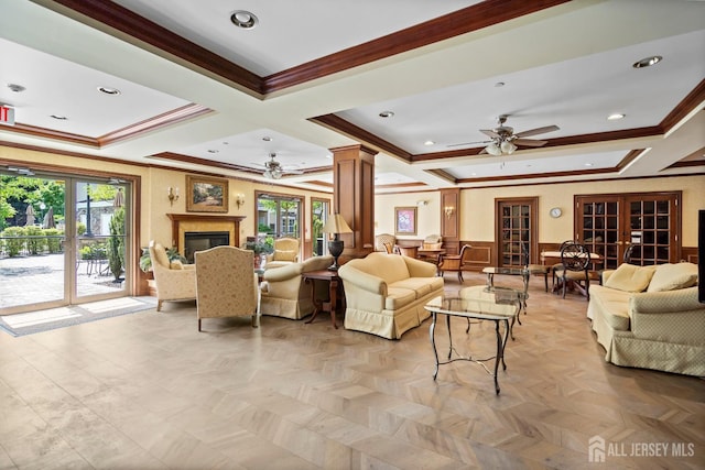 540 Cranbury Rd Unit 105, East Brunswick, NJ 08816 - living area with a ceiling fan, crown molding, coffered ceiling, healthy amount of natural light, and decorative columns