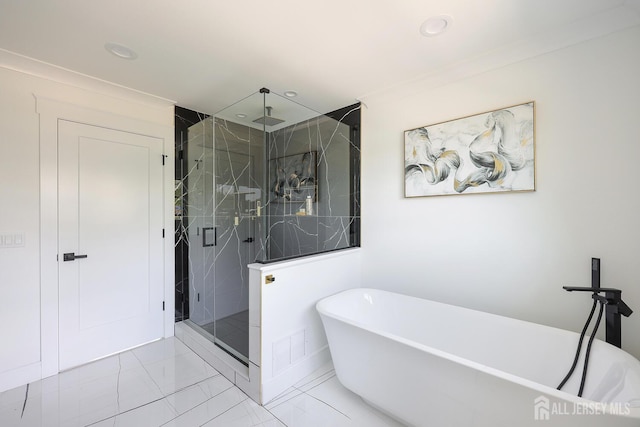 14 Thomasine St, Edison, NJ 08817 - bathroom featuring a marble finish shower, a freestanding bath, recessed lighting, and marble look tiles