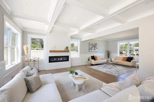 14 Thomasine St, Edison, NJ 08817 - living room with wood finished floors, coffered ceiling, beamed ceiling, a glass covered fireplace, and a wainscoted wall
